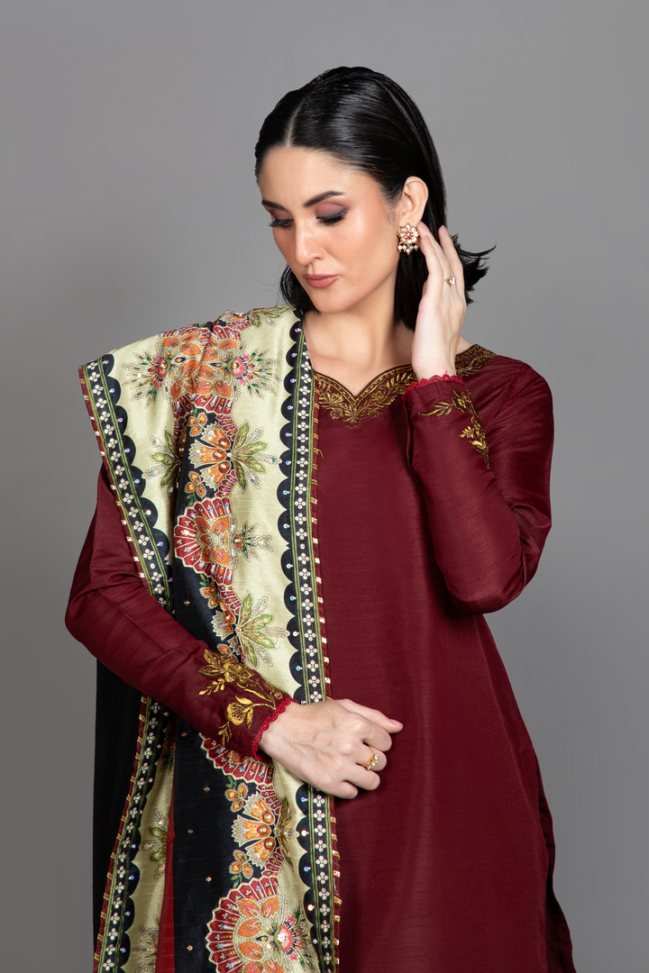 Video of Nazli maroon silk suit with black and red hand-embellished printed shawl.
