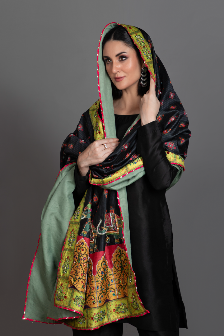 Video of Fasiha black silk suit with lime and mustard hand-embellished printed shawl.
